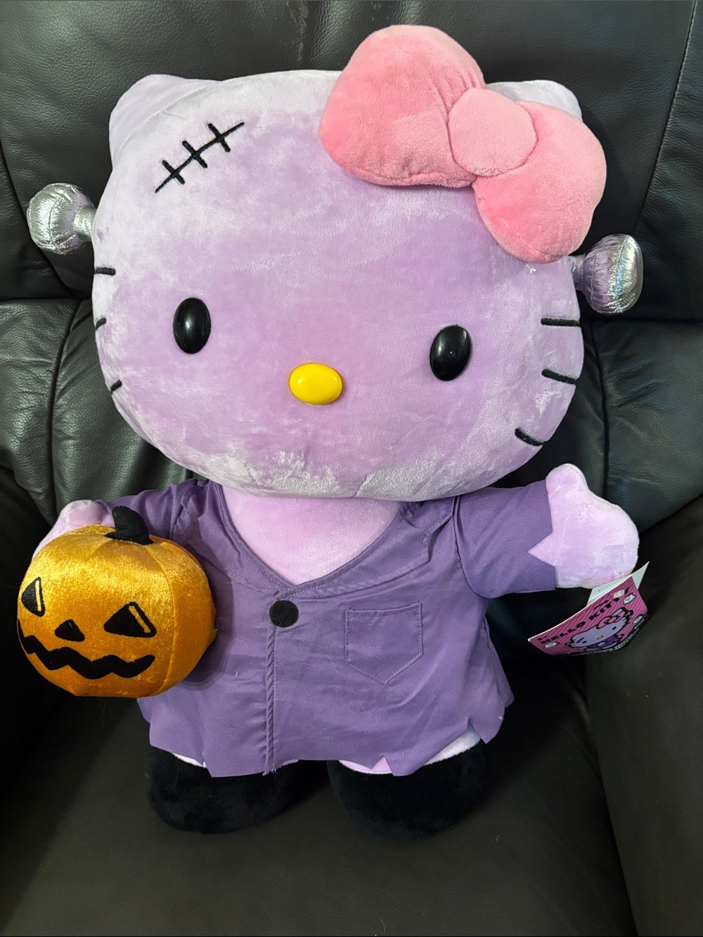 Hello Kitty Lavender Plush Halloween Costume with Pink Bow and Gold Pumpkin